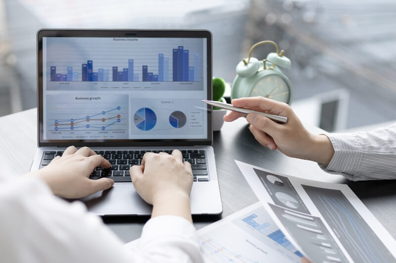 An image of two persons discussing the digital marketing strategies