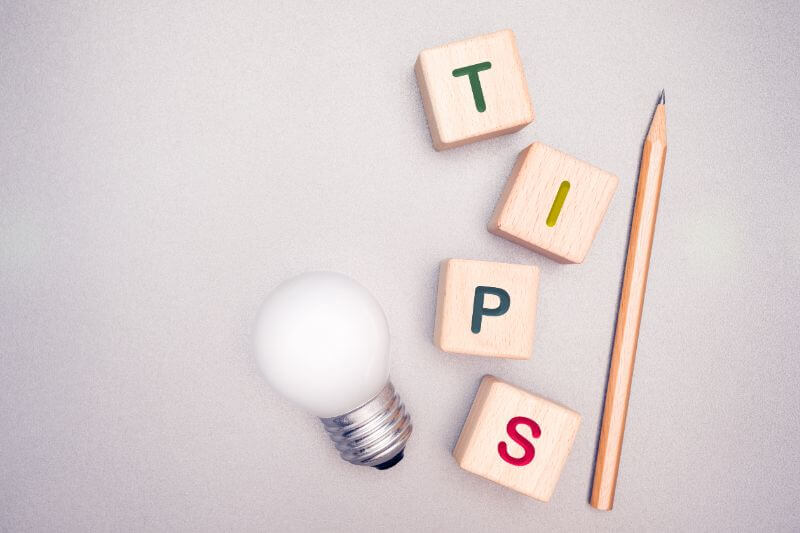 An image of blocks with tips written on it representing tips for implementing SEO audit findings.