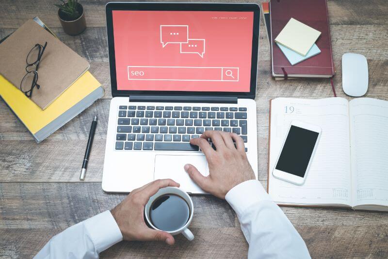 An image of a person working on an SEO audit.
